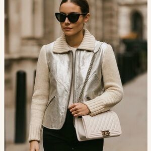 100% leather jacket with knitted sleeve